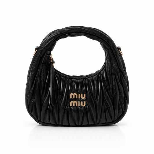 Miu Miu
mini Wander matelassé shoulder bag