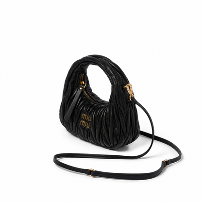 Miu Miu
mini Wander matelassé shoulder bag